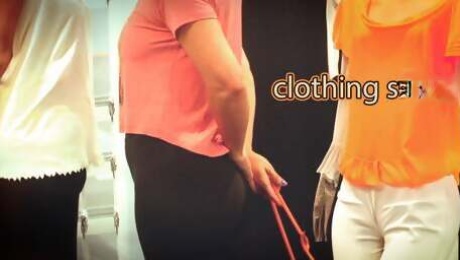Employee gives blowjob in the store fitting room.
