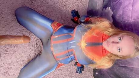 Captain Marvel rides an ebony dildo