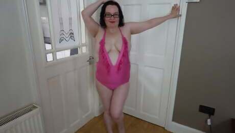 Hot Fat BBW wife stripping teasing with big breasts in pink swimsuit